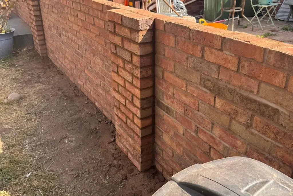 a brick wall with a brick wall in the background
